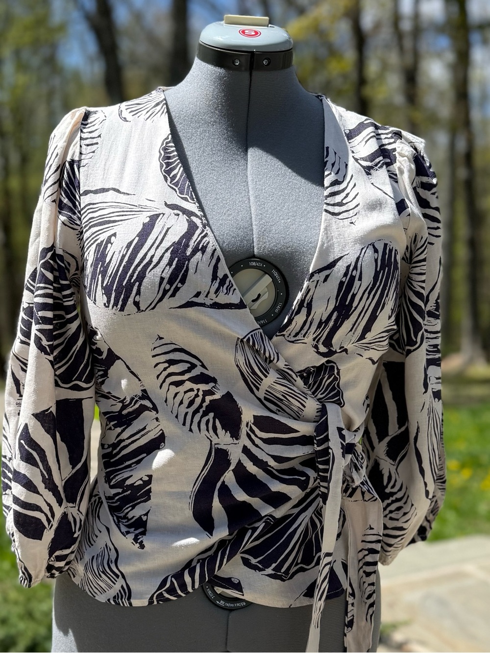 Nicole Miller Cream Wrap Blouse with Black Leaf Motif